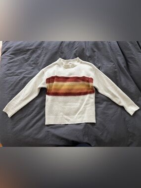 Cream sweater with maroon, yellow, orange horizontal chest stripe XS